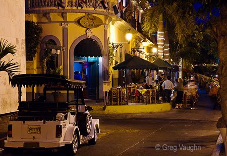 The little pulmonia taxis are the way to get around Mazatlan; this one is parked on Plaza Machado, fronting Cafe Pacifico, the oldest bar in town.