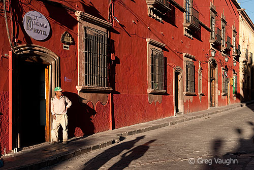 Man in doorway of La Morada Hotel in San Miguel de Allende, Mexico.