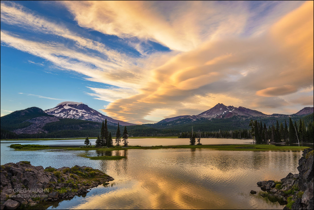 Sunset clouds over Broken Top and South Sister from Ray Atkeson Memorial viewpoint at Sparks Lake; Cascade Mountains, Central Oregon.